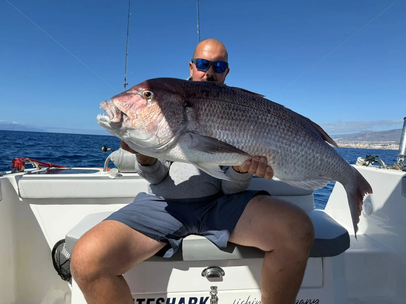 Angler with a catch on board